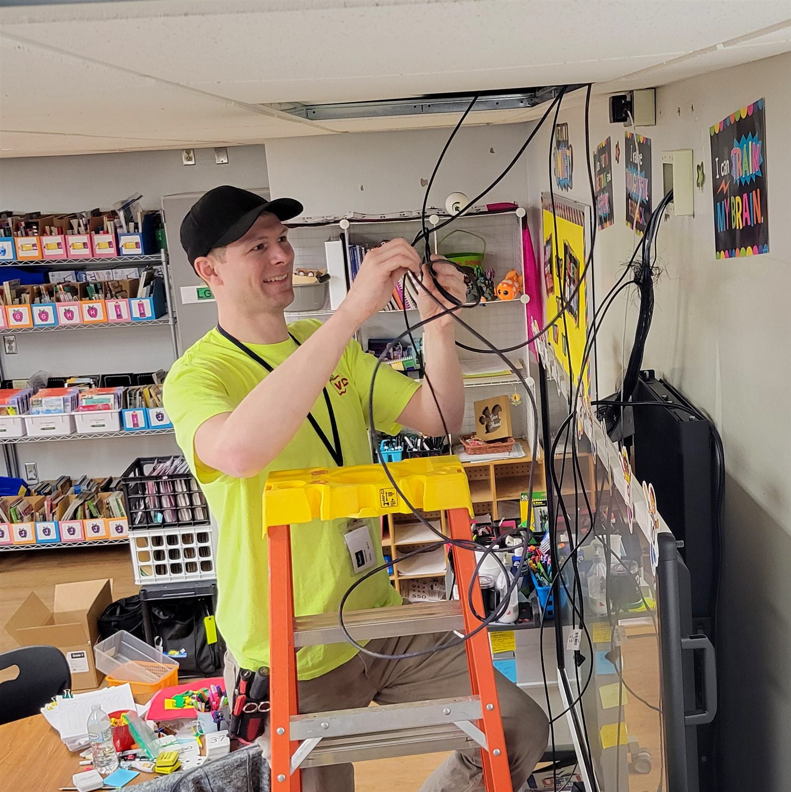 VSC technician installing classroom technology